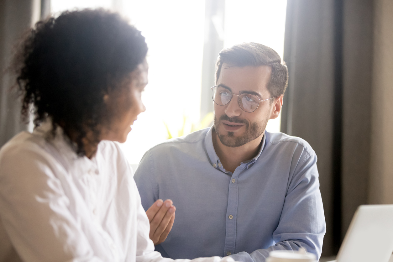 male teacher coaching a female teacher