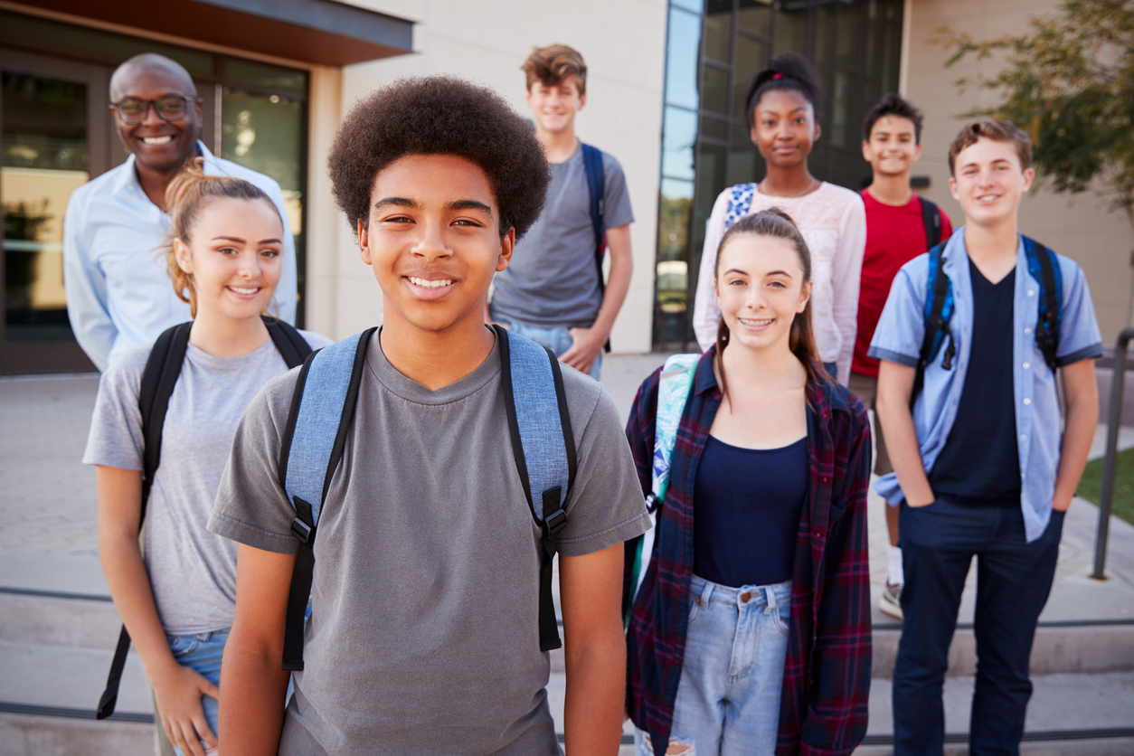A group of happy and diverse high school students